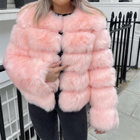pink faux fur coat heavy so shipping is £5 depop