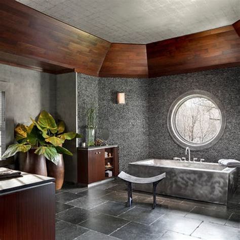 Ultra Luxury Bathroom With Steel Plated Tub And Marble Flooring And