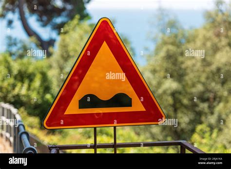 Triangular Road Sign Of Bumpy Road It Is A Danger Sign That Announces