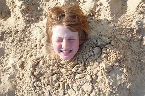 Being Buried To The Neck In Sand Isnt Fun And Its Deadly