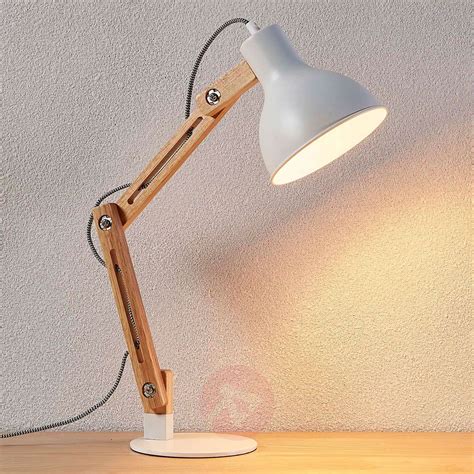 What are a few brands that you carry in desks? Wood desk lamp Shivanja with white lampshade | Lights.co.uk