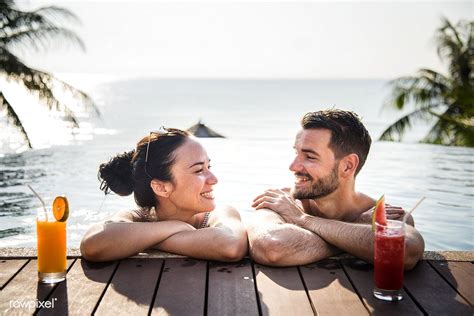 Young Couple Relaxing At A Resort Premium Image By Tropical Honeymoon