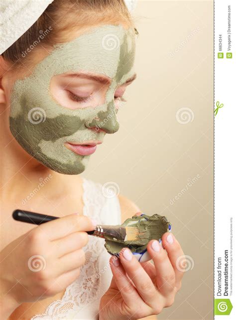 Woman Applying With Brush Clay Mud Mask To Her Face Stock Photo Image Of Skincare Skin