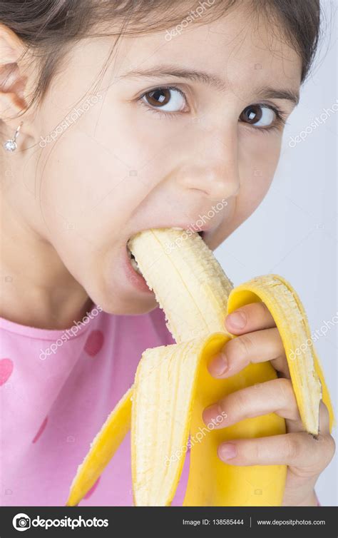 Child Eating Banana Stock Photo By ©biljuska1 138585444