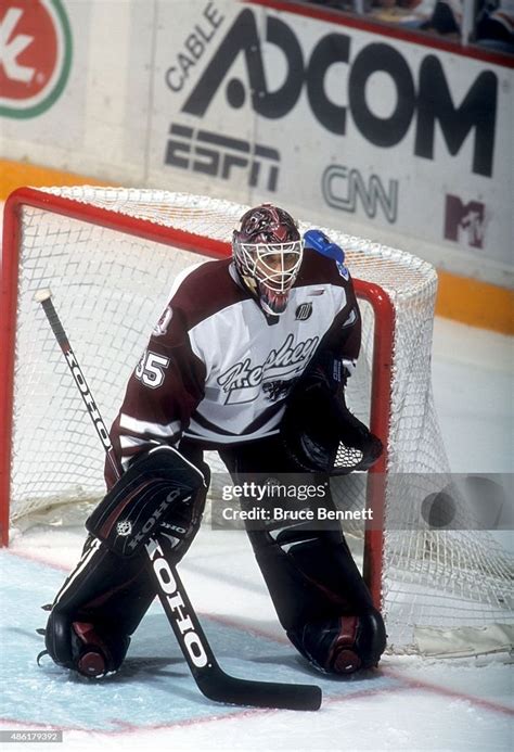 Goalie Marc Denis Of The Hershey Bears Defends The Net During An Ahl