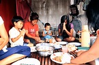 Filipino Family Praying Together