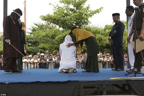 Woman Is Caned In Public For Having Sex Outside Wedlock In Indonesia