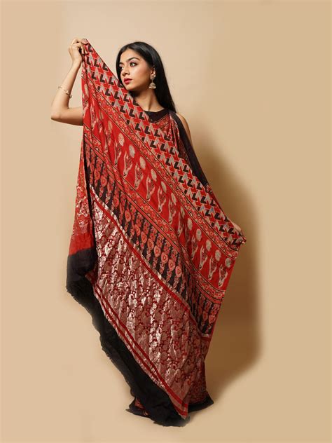 Gorgeous Ajrak Modal Silk Saree In Circular Motifs With Zari Palla