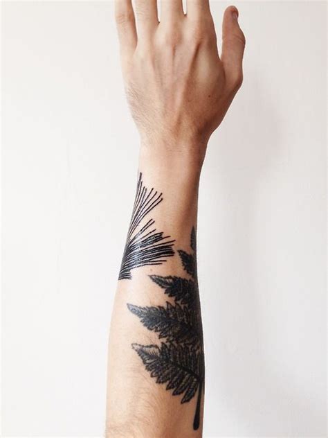 Black Leaves Tattoo On Hand