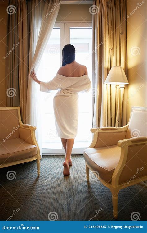 Woman In Bathrobe In Hotel Room Beautiful Girl With Wet Hair Stock Image Image Of Back