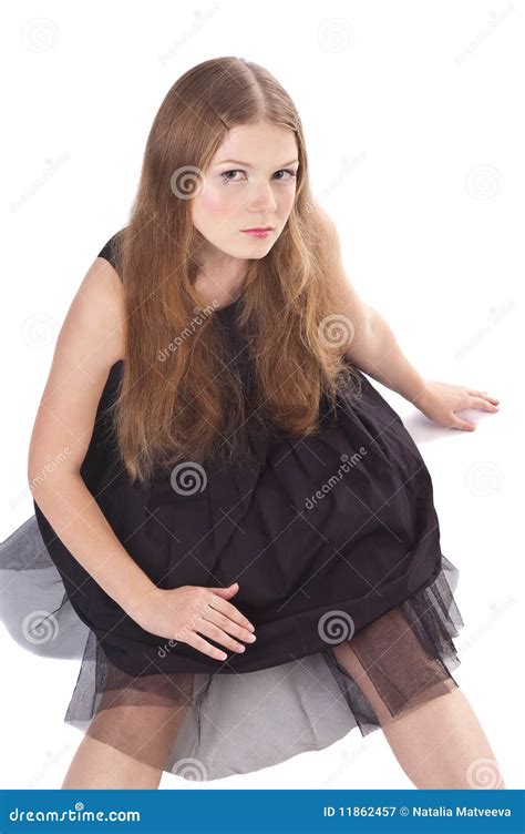 Portrait Of Long Haired Girl Sitting On The Floor Stock Image Image