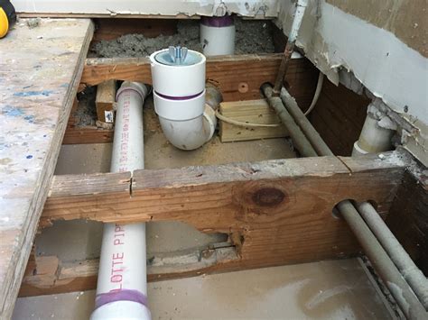 Plumbing How To Reinforce A Joist With Plumbing Running Through It