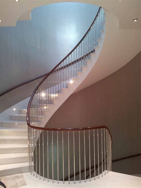 Helical Staircase With Stainless Steel Balustrade And Walnut Handrail