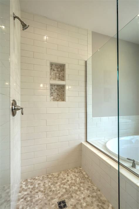 Repairing a leaking shower head that drips when turned off is more complicated but, depending on the cause, may also be solved without a plumber. Tiled shower and soaking tub with tile surround (With ...