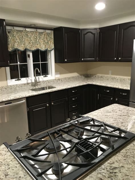 If a custom color sample is ordered, the $250 charge will be paid per color, but will not have to be paid again if cabinets are ordered in the same color(s) as the sample(s) within 1 year. Dark cabinets and light colored granite | Light colored granite, Dark cabinets, Kitchen appliances