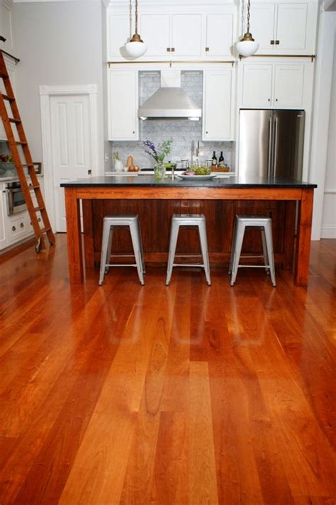 Solid Hardwood Cherry Floors Bring Warmth To A White Kitchen Cherry