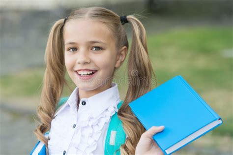 Book Is Uniquely Portable Magic Happy Schoolgirl Hold Book Outdoors