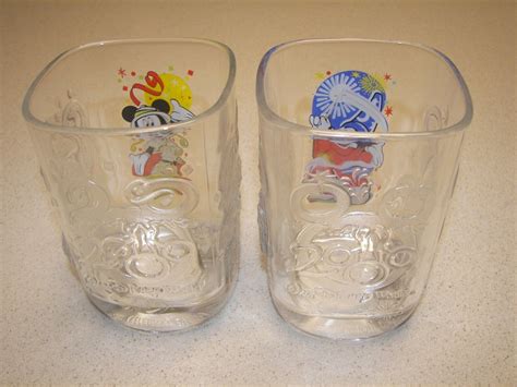 Two Walt Disney World Celebration 2000 Square Drinking Glasses Ebay