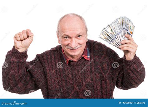 Senior Man Holding A Stack Of Money Portrait Of An Excited Old