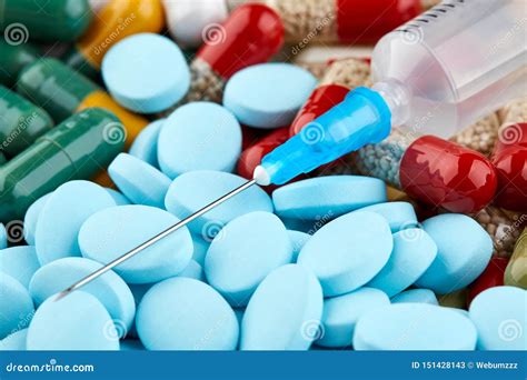 close up photo of syringe and many colorful pills stock image image of capsule cure 151428143