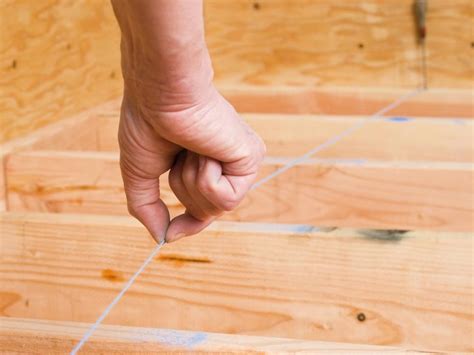 Before laying tile or installing a tile underlayment like schluter ditra, it's important to check the subfloor to ensure a flat, even surface. How to Lay a Subfloor | Plywood subfloor, Diy installation ...