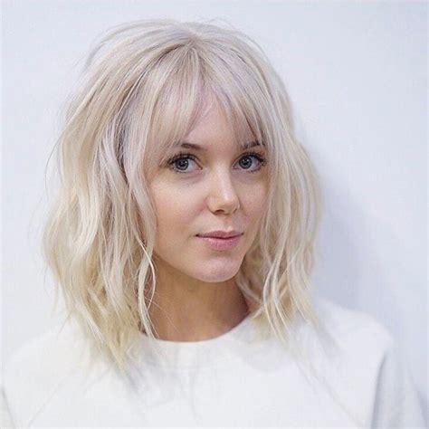 Long Platinum Bob With Wavy Fringe And Parted Bangs The Latest