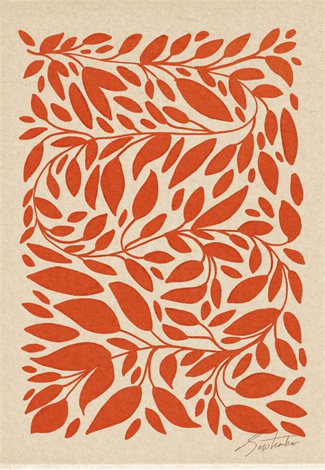 an orange and white print with leaves on it