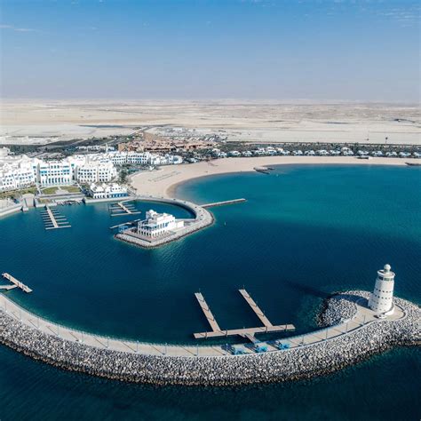Arabian Gulf Lighthouse And Hilton Salwa Beach Resort Explorest