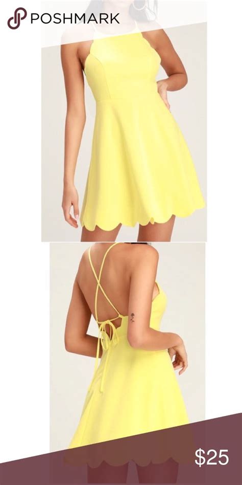 Yellow Mini Dress Skinny Straps Support A High Rounded Neckline As They Crisscross And Tie Over