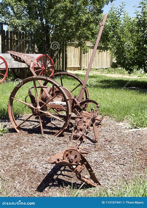 Old Farm Equipment In The Garden Stock Image Image Of Decorations
