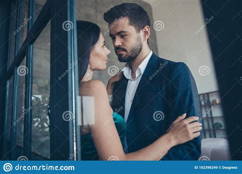 Photo Of Tenderness Couple Guy Trendy Lady Leaning Glass Wall Door