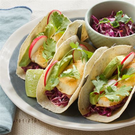 · dredge in flour mixed with the spices. Recipe: Crispy Cod Tacos with Chipotle-Cabbage Slaw - Blue ...