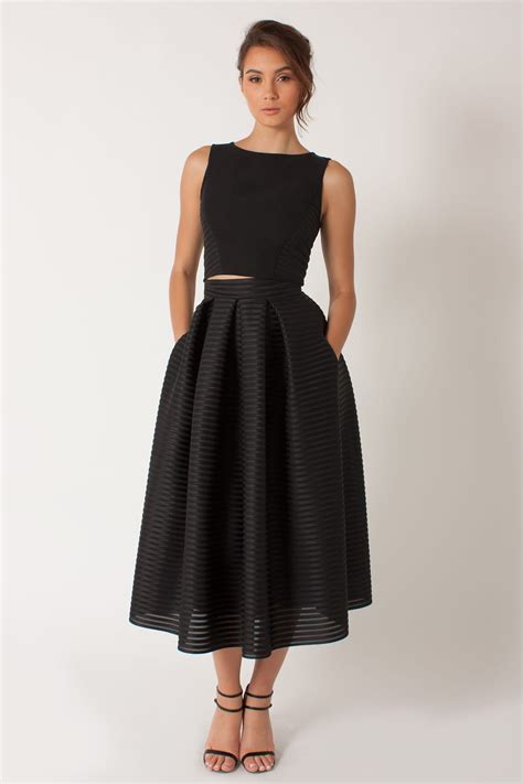 For an evening black tie wedding with a church wedding ceremony, look for a stylish dress with covered shoulders or a matching jacket. Pin by GonzoGato.Mews on Black is best | Black tie wedding ...