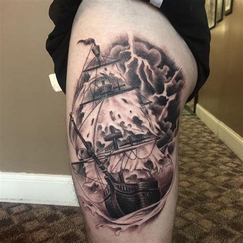 Discover cool impossible bottles with the top 60 best ship in a bottle tattoo designs for men. Pirate Ship Tattoo