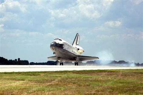 The Orbiter Discovery Touches Down On Runway 15 Of Kscs Shuttle