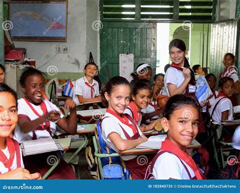 A Group Of Students Sitting In Their Classroom In Cuba Editorial Image