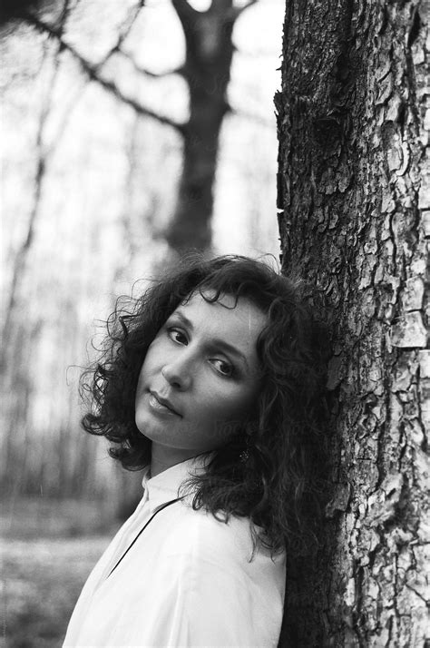 A Beautiful Relaxed Woman In A Forest Del Colaborador De Stocksy Anna Malgina Stocksy