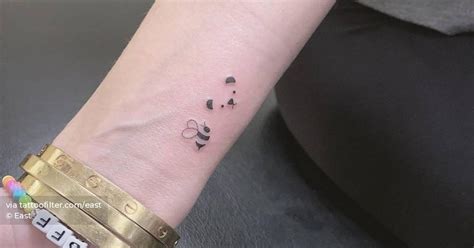 Minimalistic Bee And Bear Tattoo Done On The Wrist