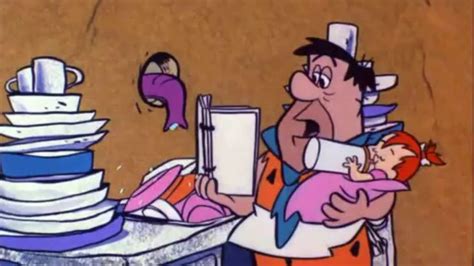 Fred Trying To Take Care Of Pebbles In The Flintstones Episode Carry On