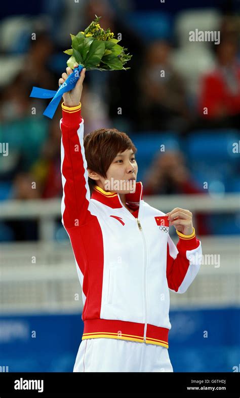 li jianrou of china celebrates on the podium after winning the women s 500m short track