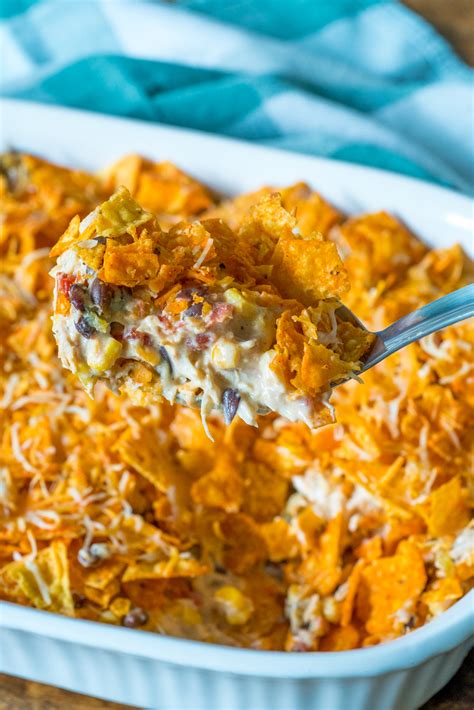 Spoon the chicken mixture on top of the crushed doritos in the casserole. Doritos Chicken Casserole - 12 Tomatoes