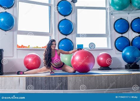 At Gym Smiling Brunette Doing Stretching Exercise Stock Image Image