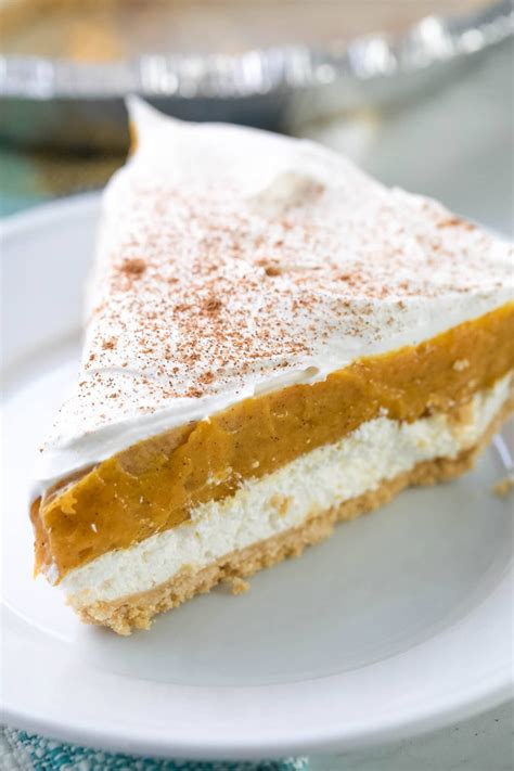 no bake pumpkin pie made with a graham cracker crust and layers of cream cheese spiced pumpki
