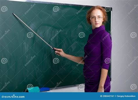 teacher standing in front of blackboard stock image image of classroom beautiful 208442161