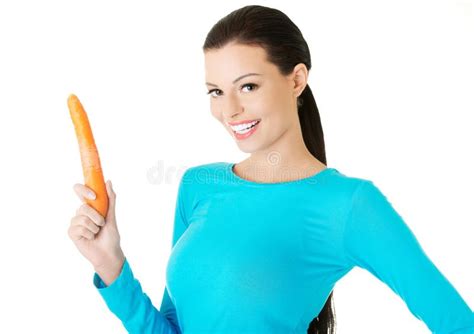 Happy Young Woman Holding A Carrot Stock Image Image Of Diet