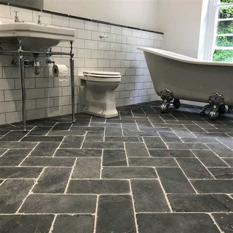If you really want to have the best look in your bathroom, off course there are some important things that you need to do. Slate herringbone grey tiles and flooring