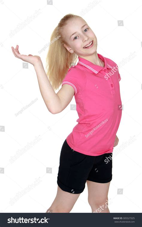 Cheerful Blonde Teen Girl In Pink Shirt And Short Black