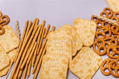 Salty Crackers Sticks Pretzels Top View Above Blue Background Party