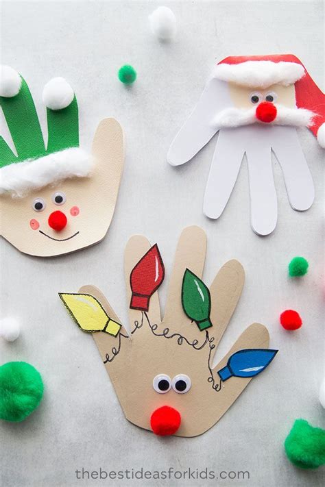 Cut a sheet in half crosswise and then fold it over, making a single fold. Christmas Handprint Cards | Christmas crafts for kids ...