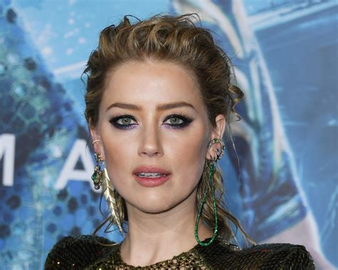 Amber Heard Denies Reports Shes Been Cut From Aquaman 2 The
